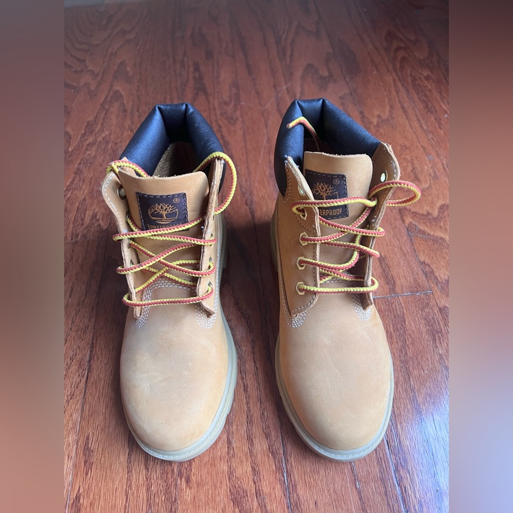 Timberland Kids Wheat Tan Boots with Black Collar and Yellow/Red Laces